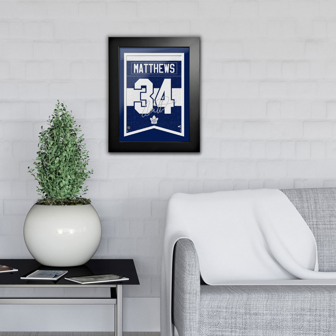 Toronto Maple Leafs Art-Auston Matthews Autograph Replica Frame 12"x16" in living room